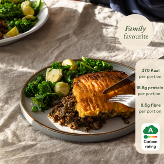 Vegan cottage pie on a tablecloth, featuring nutritional information.